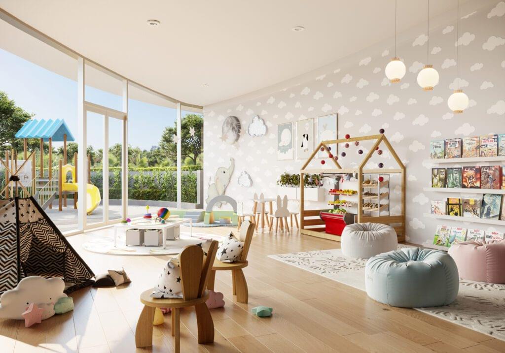Cozy children's activity room with play structures, bean bags, and floor-to-ceiling windows at Aria Reserve Residences.