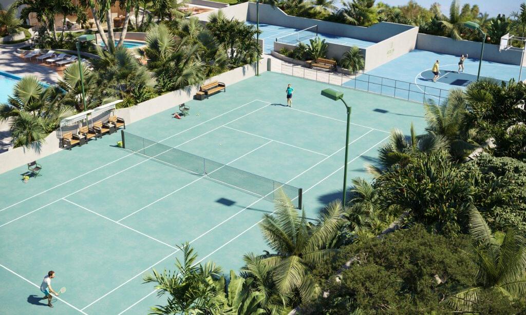 Outdoor tennis court surrounded by lush greenery at Aria Reserve Residences.